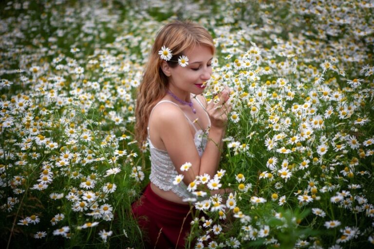 Spring Reset Ideas. Woman in field of flowers.